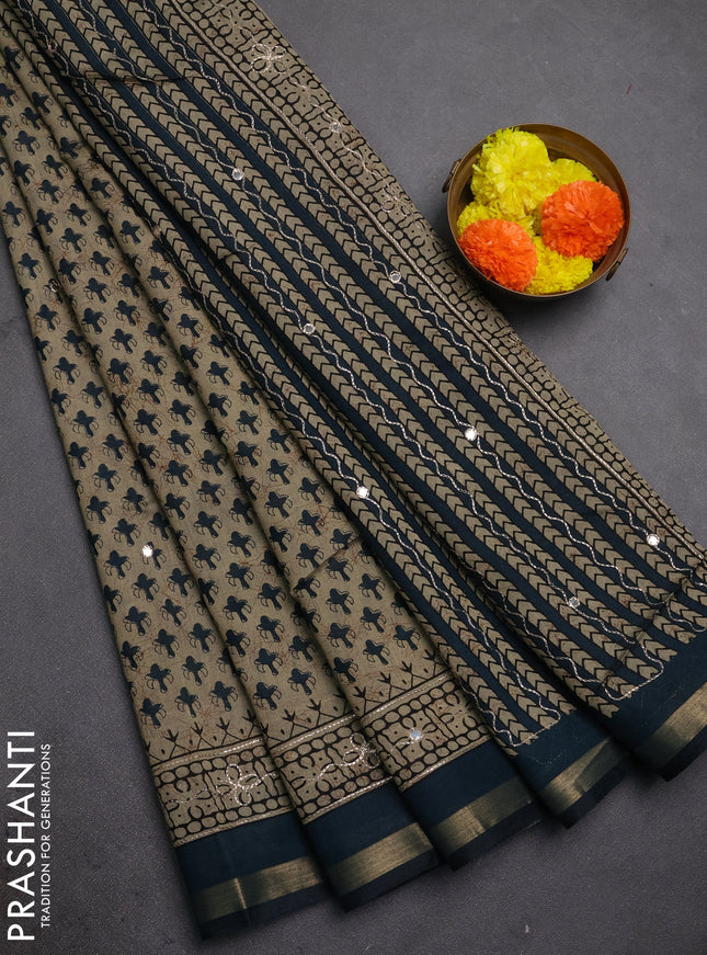 Maheshwari cotton saree beige and peacock green with allover butta prints & mirror work and zari woven embroidery border