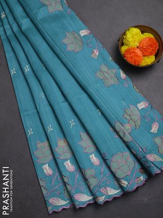 Teal Blue Shade Semi Raw Silk Saree - Embroidery Work