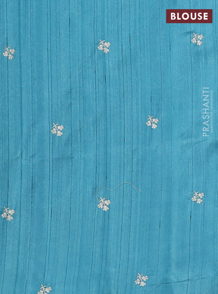 Teal Blue Shade Semi Raw Silk Saree - Embroidery Work