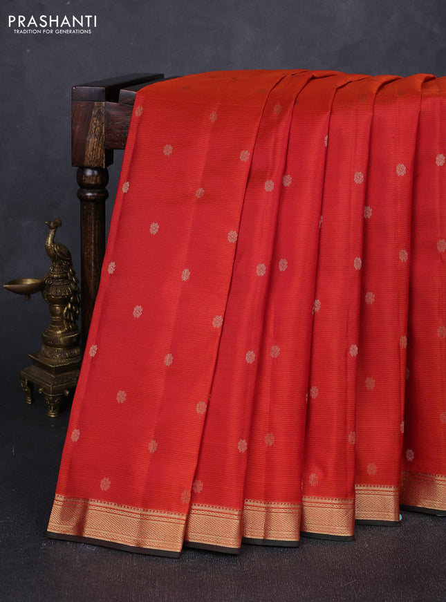 Pure kanchipuram silk saree rust shade and bottle green with allover zari woven buttas and zari woven border