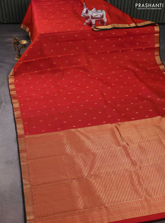 Pure kanchipuram silk saree rust shade and bottle green with allover zari woven buttas and zari woven border