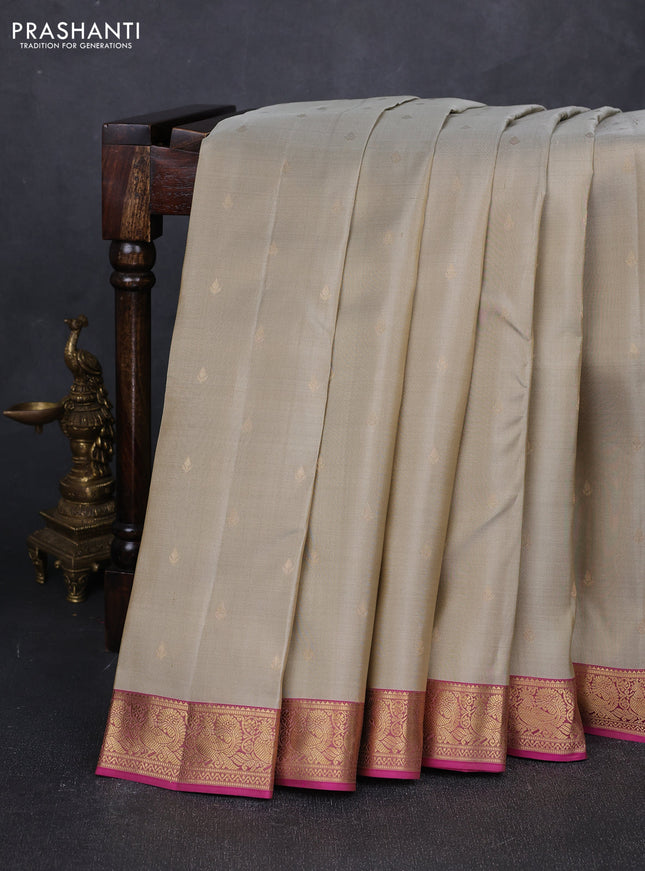 Pure kanchipuram silk saree beige and pink with allover zari woven buttas and rich zari woven annam border
