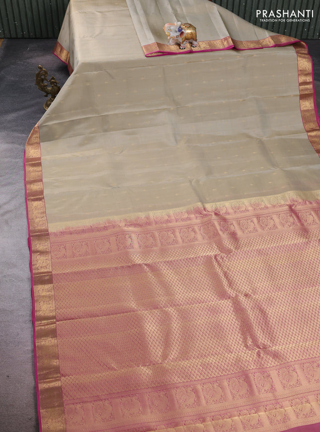 Pure kanchipuram silk saree beige and pink with allover zari woven buttas and rich zari woven annam border