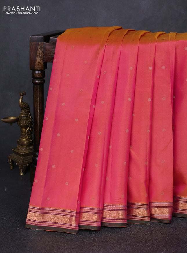 Pure kanchipuram silk saree dual shade of pinkish yellow and bottle green with allover zari woven buttas and zari woven border