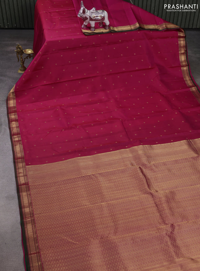 Pure kanchipuram silk saree pink and bottle green with allover zari woven buttas and zari woven border
