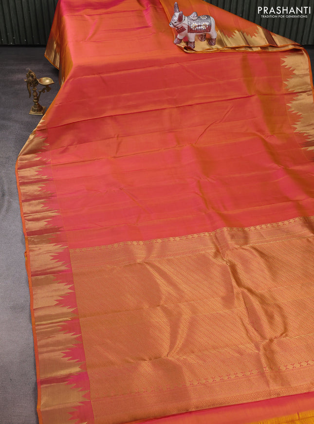Pure kanchipuram silk saree dual shade of pinkish yellow with plain body and temple design zari woven border