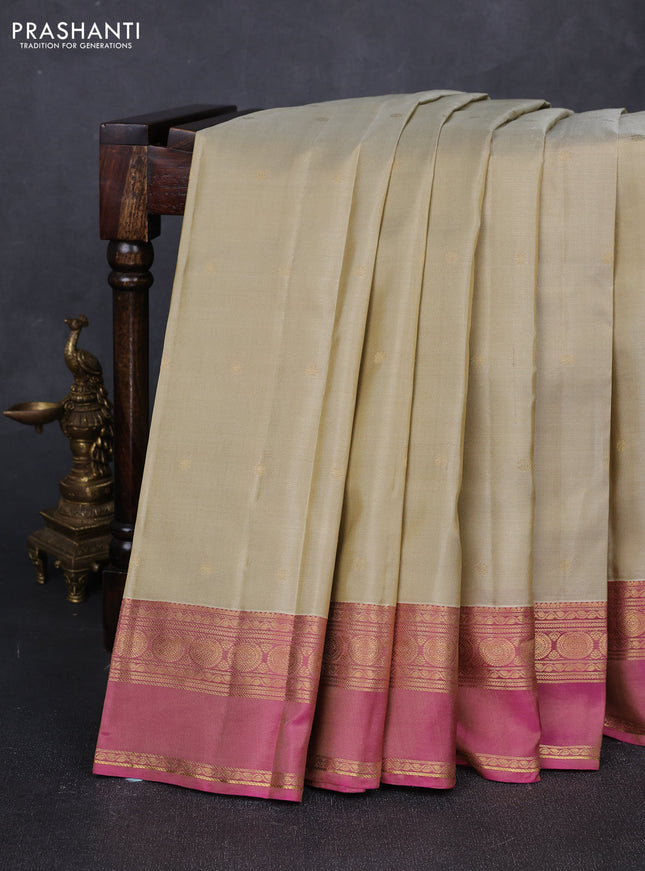 Pure kanchipuram silk saree beige and pink with allover zari woven buttas and rettapet zari woven border