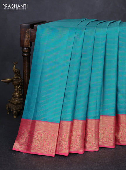 Pure kanchipuram silk saree teal blue and peach pink with allover zari stripe pattern and rich zari woven border