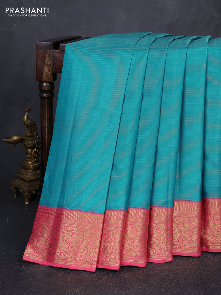 Pure kanchipuram silk saree teal blue and peach pink with allover zari stripe pattern and rich zari woven border