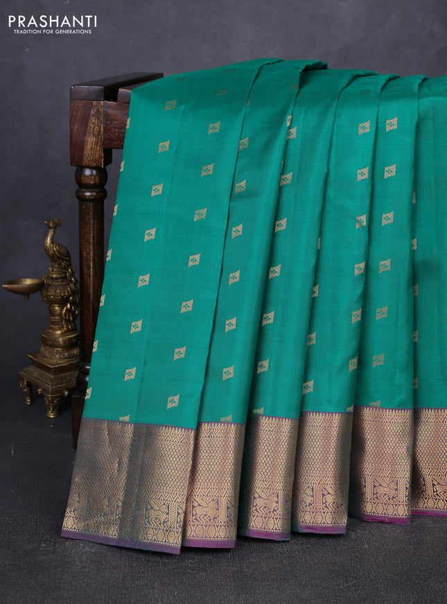 Pure kanchipuram silk saree green and purple with allover zari woven buttas and zari woven border