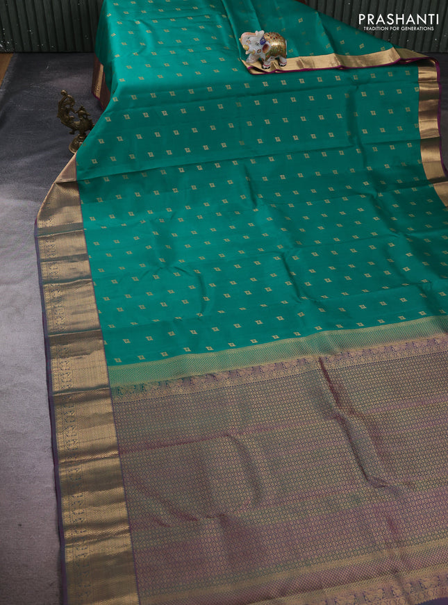 Pure kanchipuram silk saree green and purple with allover zari woven buttas and zari woven border