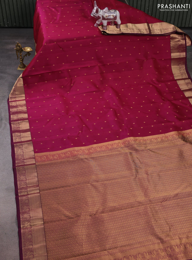 Pure kanchipuram silk saree dark magenta pink and wine shade with allover zari woven buttas and rich zari woven annam border