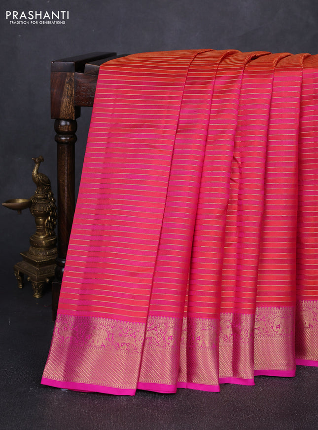 Pure kanchipuram silk saree dual shade of orange and pink with allover zari stripe pattern and rich zari woven border