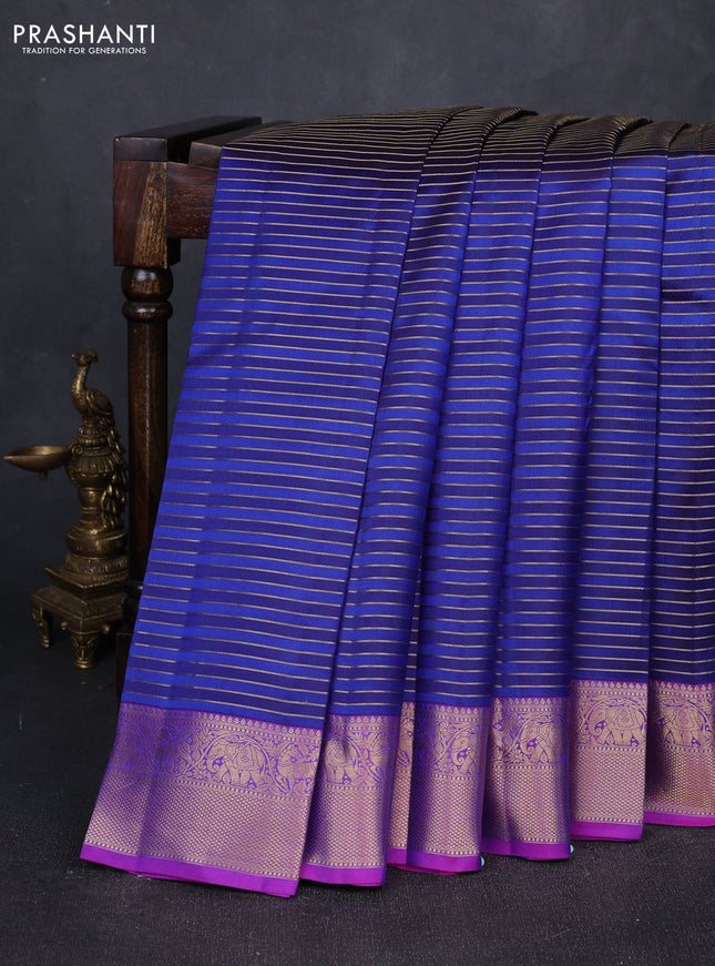 Pure kanchipuram silk saree blue and purple with allover zari stripe pattern and rich zari woven border
