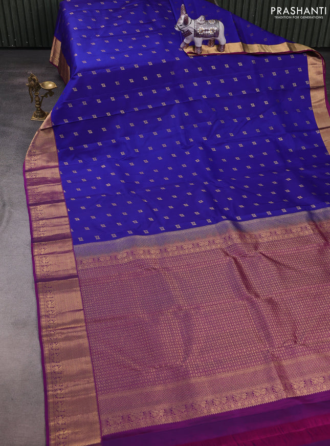 Pure kanchipuram silk saree royal blue and purple with allover zari woven buttas and rich zari woven border