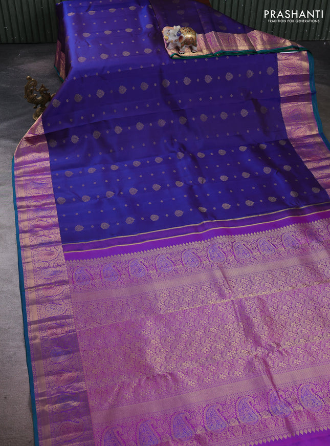 Pure kanchipuram silk saree blue and purple with allover zari woven buttas and rich zari woven paisley border