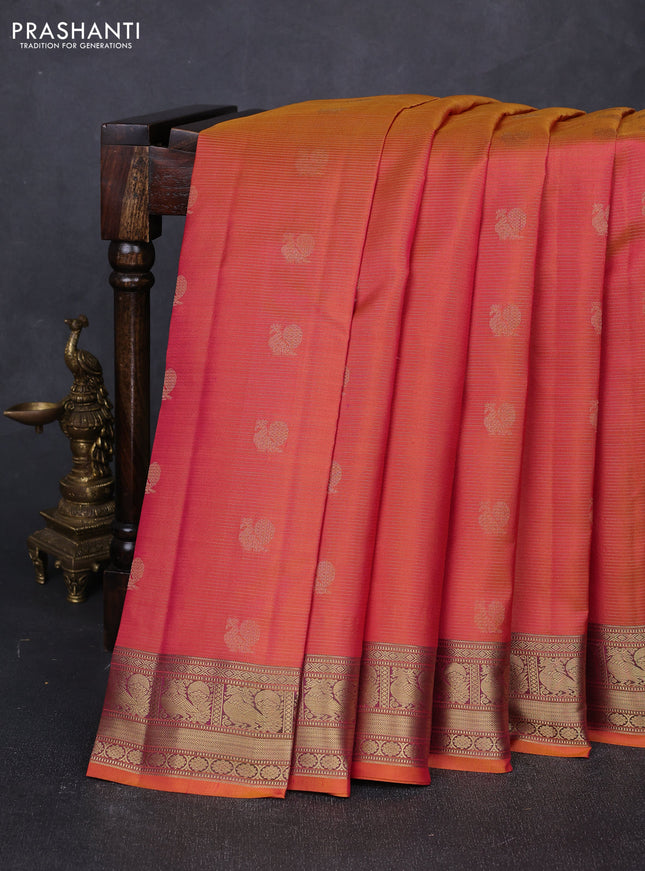 Pure kanchipuram silk saree dual shade of pinkish orange and dual shade of green with allover vairaosi pattern & buttas and annam zari woven border