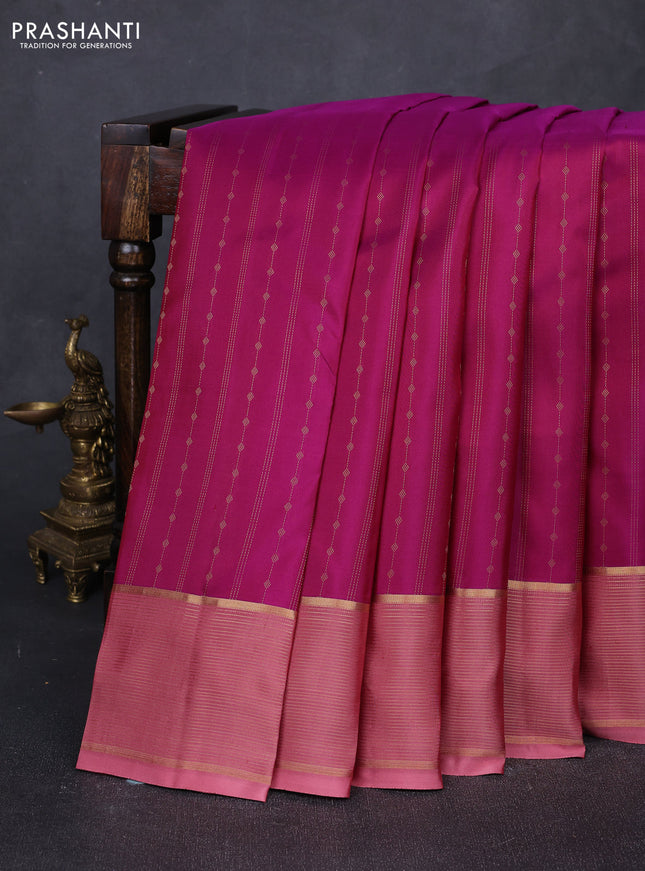 Pure kanchipuram silk saree magenta pink and dark peach with allover zari weaves and zari woven border