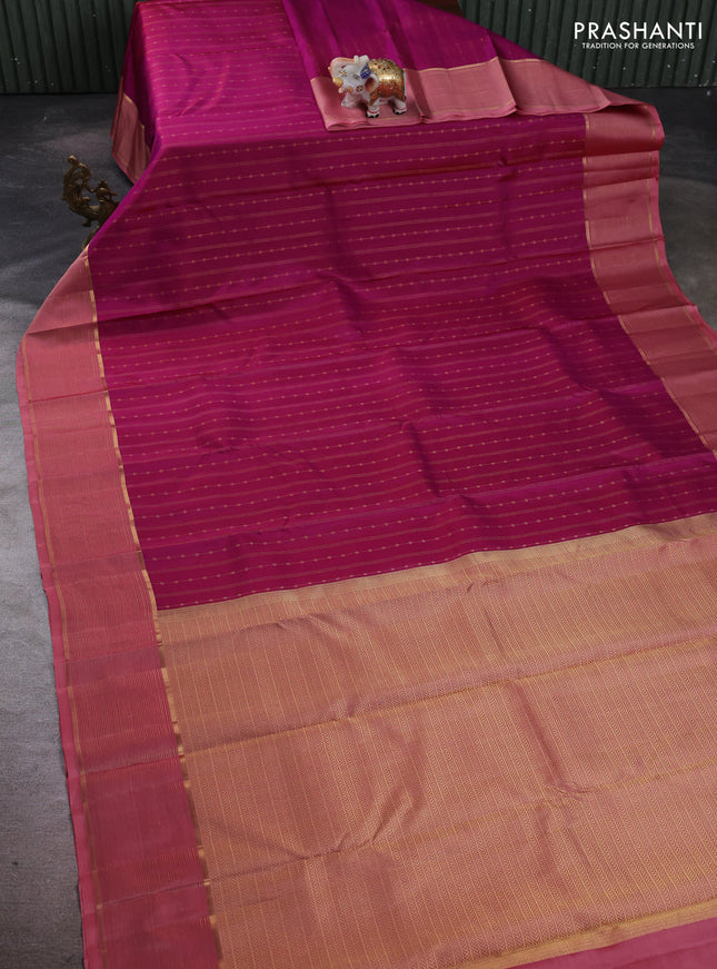 Pure kanchipuram silk saree magenta pink and dark peach with allover zari weaves and zari woven border