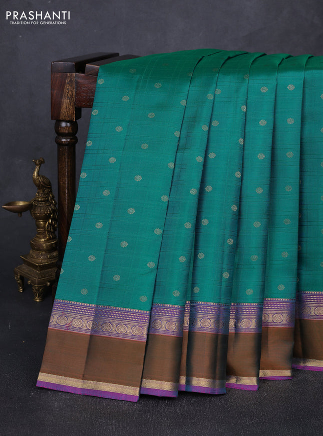 Pure kanchipuram silk saree teal green and purple with allover self emboss & zari buttas and rettapet zari woven border