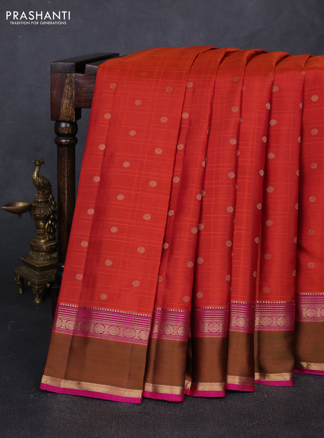 Pure kanchipuram silk saree rust shade and magenta pink with allover self emboss & zari buttas and rettapet zari woven border