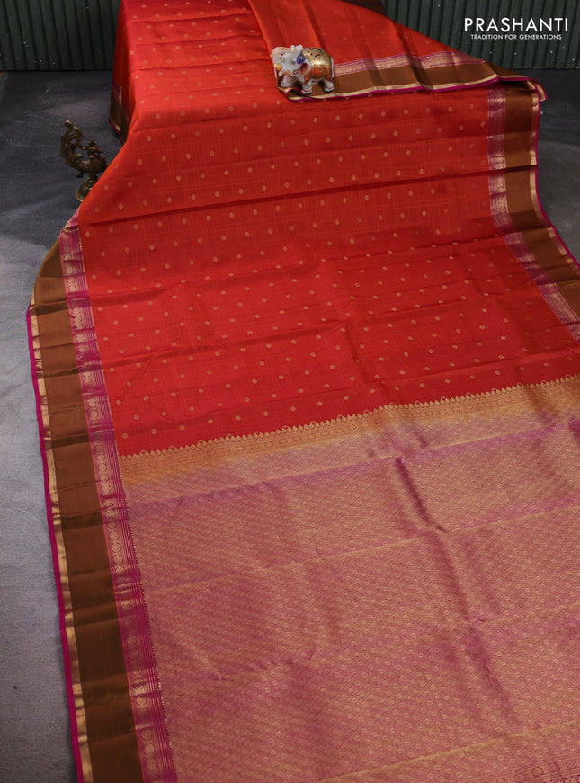 Pure kanchipuram silk saree rust shade and magenta pink with allover self emboss & zari buttas and rettapet zari woven border