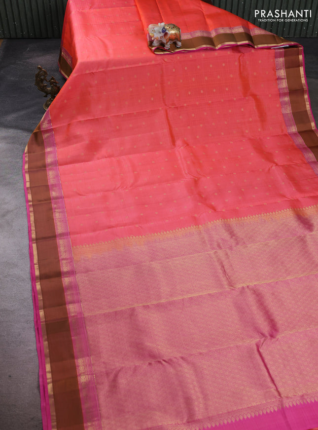 Pure kanchipuram silk saree peach orange and pink with allover self emboss & zari buttas and rettapet zari woven border