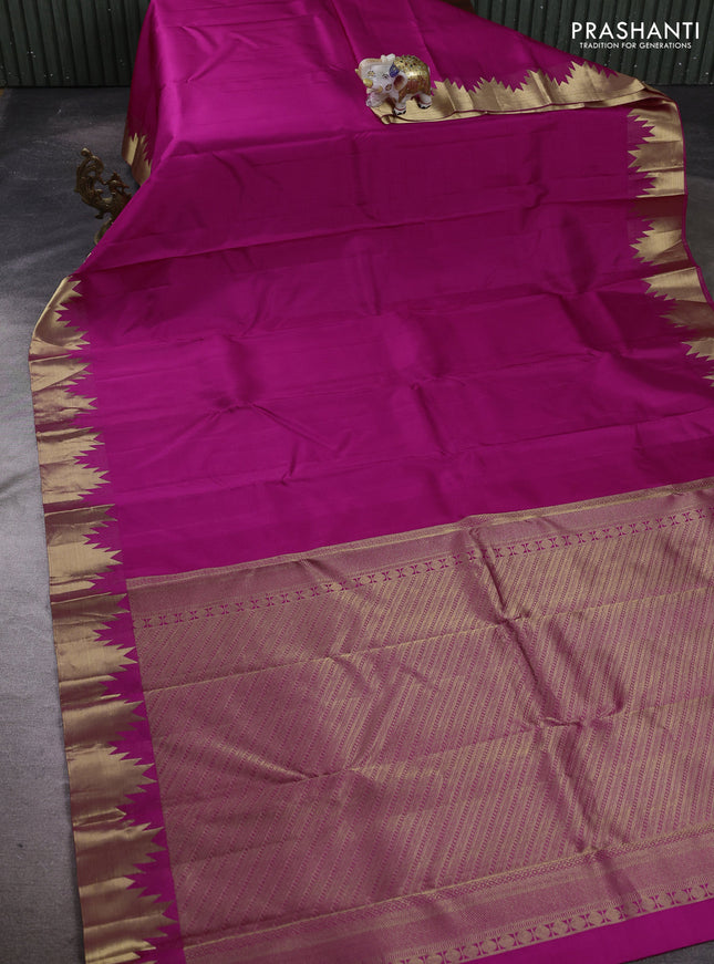 Pure kanchipuram silk saree pink with plain body and temple design zari woven border
