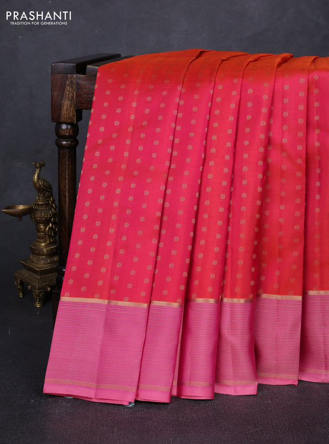 Pure kanchipuram silk saree dual shade of pinkish orange and light pink with allover zari woven 1000 buttas and zari woven border