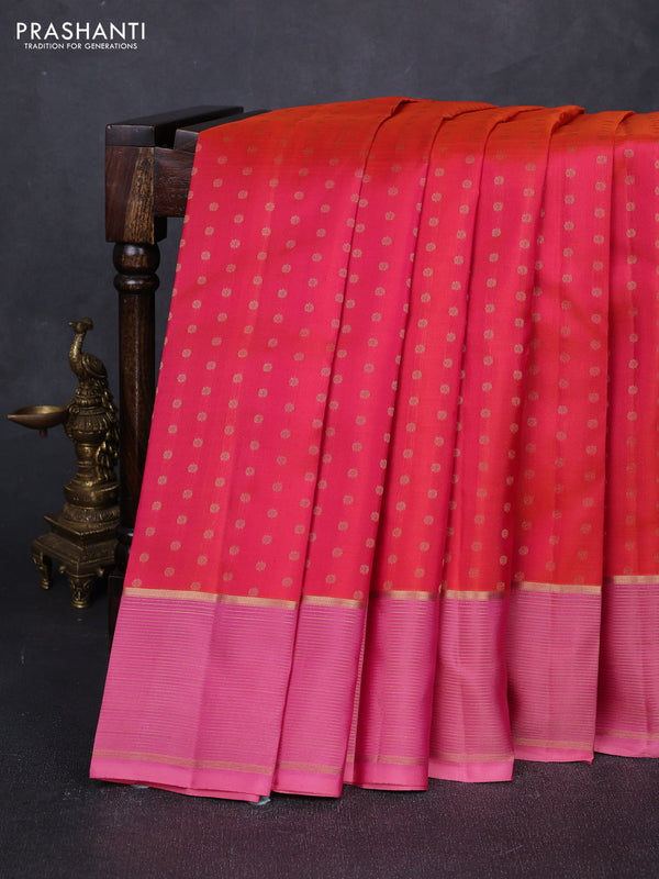 Pure kanchipuram silk saree dual shade of pinkish orange and light pink with allover zari woven 1000 buttas and zari woven border