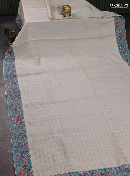 Off White & Teal Green Semi Tussar Embroidery Saree - Printed Blouse