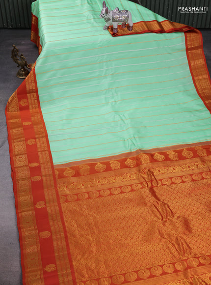 Teal Green & Rust Gadwal Silk Saree