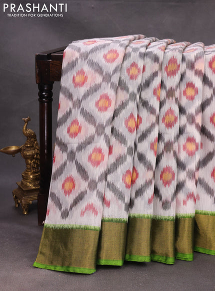Off White & Green Ikat Silk Cotton Saree