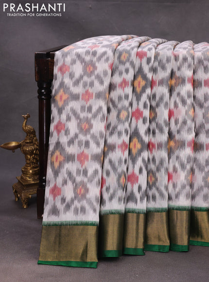 Off White & Green Ikat Silk Cotton Saree