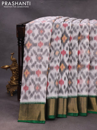 Off White & Green Ikat Silk Cotton Saree