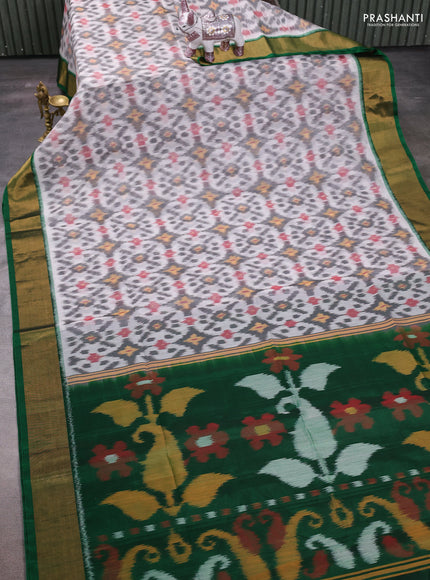 Off White & Green Ikat Silk Cotton Saree