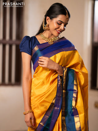 Pure kanchipuram silk saree mango yellow and blue with paisley zari woven buttas and rettapet zari woven border