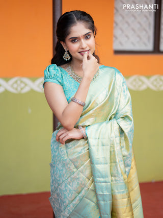 Pure kanchipuram tissue silk saree dual shade of teal blue with allover silver zari woven brocade weaves and long zari woven border