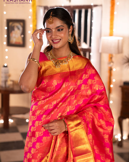 Pure kanchipuram silk saree pink and orange with allover zari woven stripes pattern and zari woven border