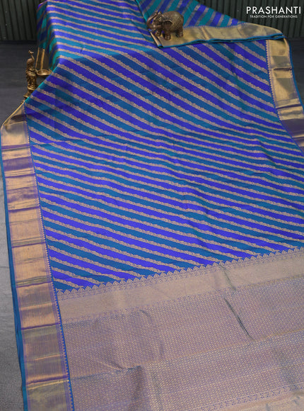 Pure kanchipuram silk saree blue and peacock blue with allover zari woven stripes pattern and zari woven border