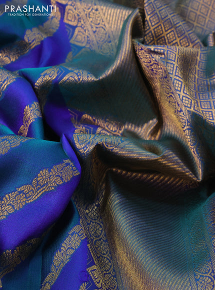 Pure kanchipuram silk saree blue and peacock blue with allover zari woven stripes pattern and zari woven border