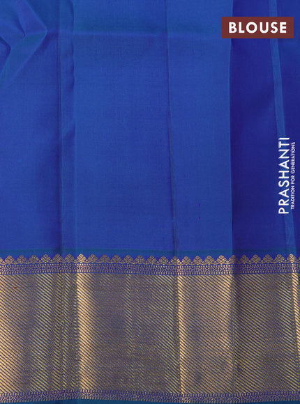 Pure kanchipuram silk saree blue and peacock blue with allover zari woven stripes pattern and zari woven border