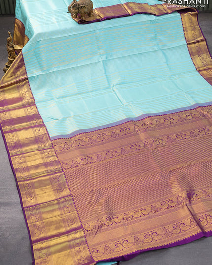 Pure kanjivaram silk saree light blue and violet with allover silver & gold zari weaves and long zari woven border