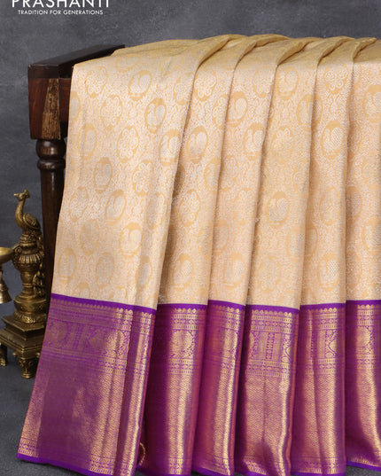 Pure kanjivaram tissue silk saree sandal and purple with allover silver zari woven brocade weaves and annam zari woven border