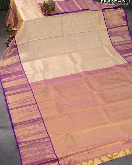 Pure kanjivaram tissue silk saree sandal and purple with allover silver zari woven brocade weaves and annam zari woven border