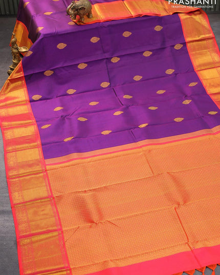 Pure kanjivaram silk saree dark blue and dual shade of pinkish orange with allover self emboss & zari buttas and rich zari woven border