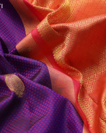 Pure kanjivaram silk saree dark blue and dual shade of pinkish orange with allover self emboss & zari buttas and rich zari woven border