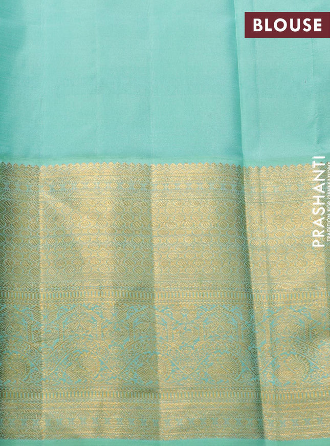 Pure kanjivaram silk saree deep purple and teal blue shade with allover annam zari woven butta weaves and rich zari woven border