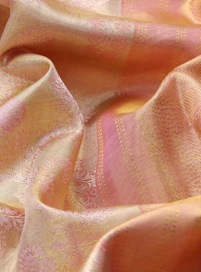 Pure kanjivaram tissue silk saree cream and light pink with allover zari woven brocade weaves and zari woven border