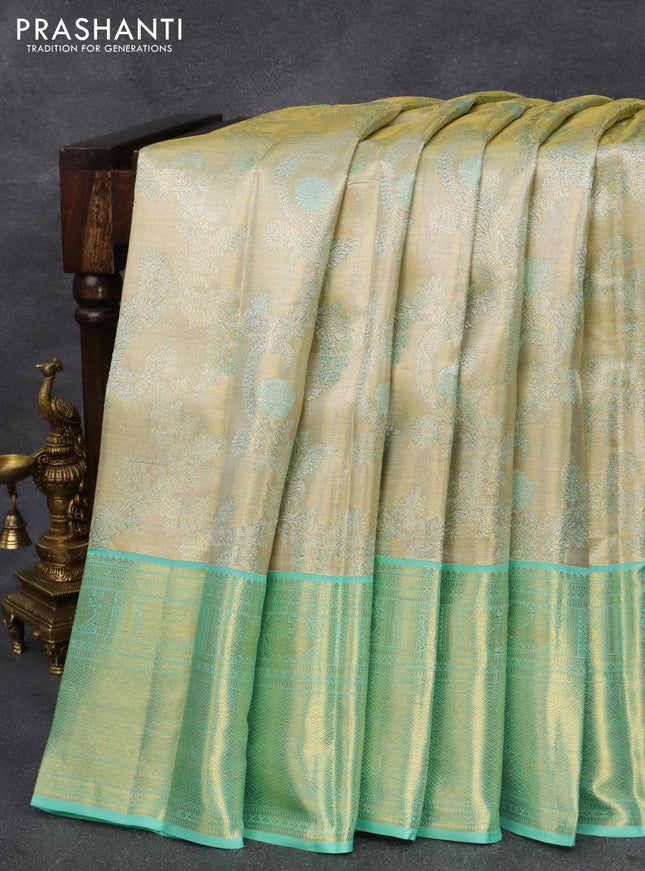 Pure kanjivaram tissue silk saree cream and teal blue with allover zari woven brocade weaves and zari woven border